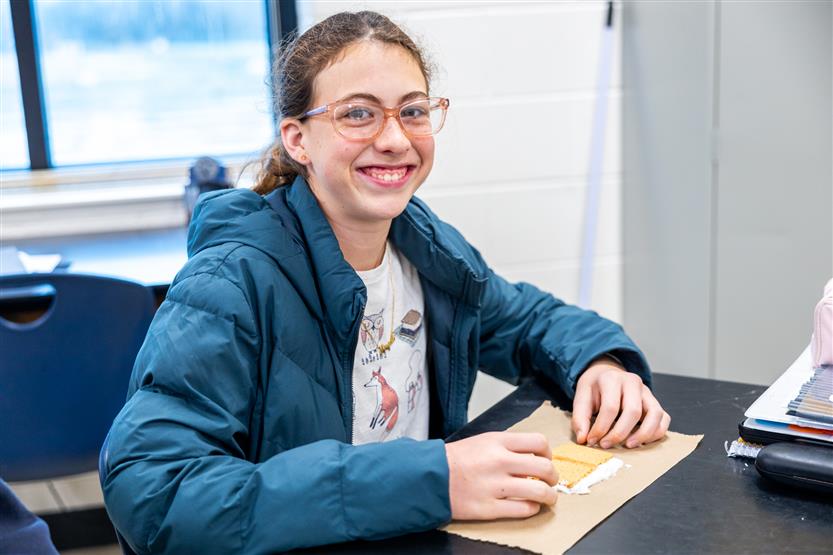 Students do a science experiment